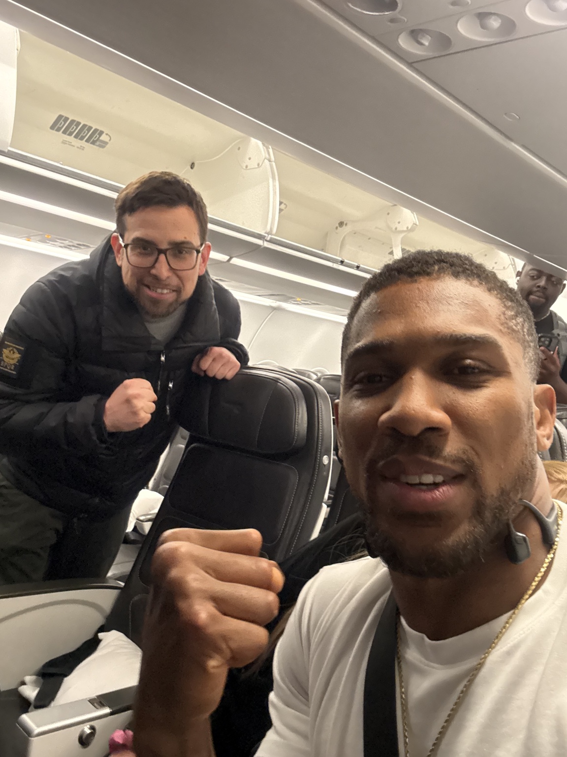 Joseph Hammond with Anthony Joshua on the return journey from GLORY in Giza in May 2026.